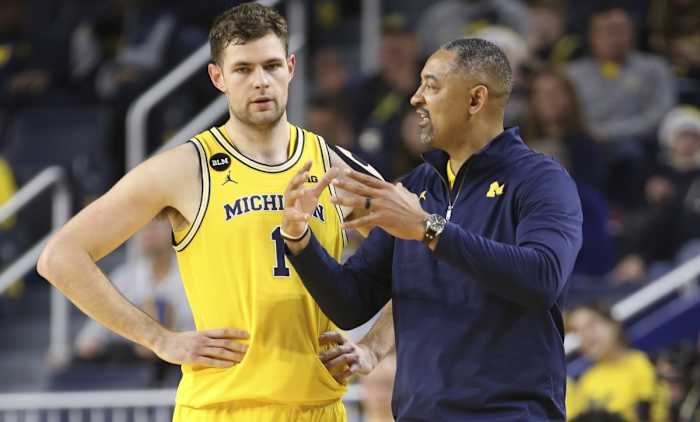 MichiganHunterDickinsonJuwanHowardSideline